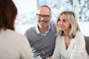 couple learning at the dentist